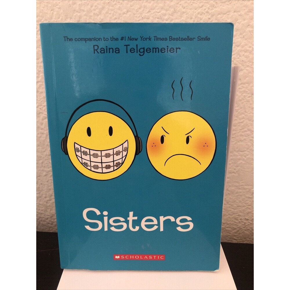Sisters Graphic Novel by Raina Telgemeier Scholastic Paperback Kids Comic Book